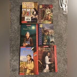 8 books. 3 American Girl, 2 The Lady Grace Mysteries & 3 Young Royals